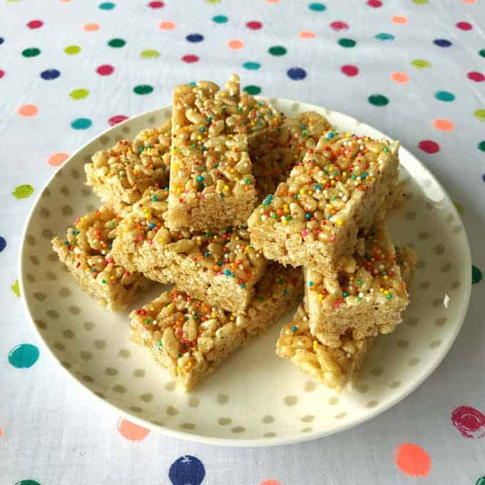 rice bubble bars on a plate with sprinkles 