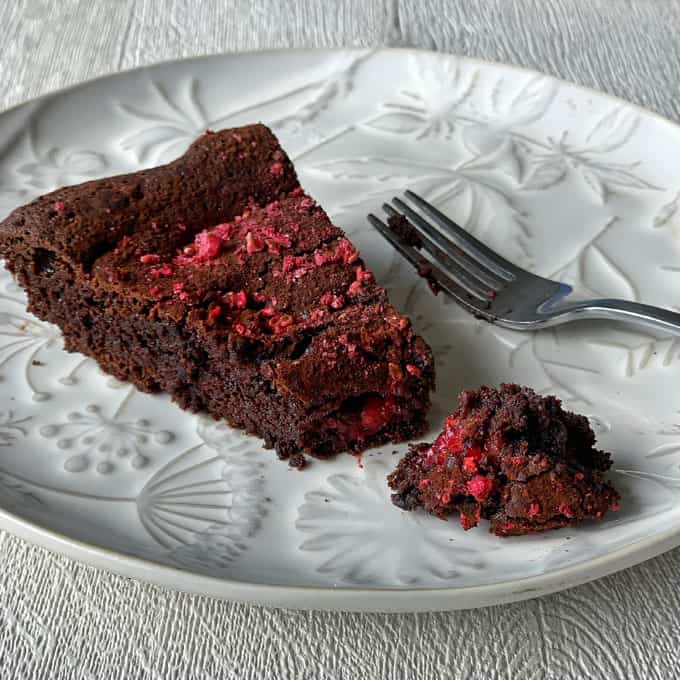 slice of raspberry and chocolate skillet brownie