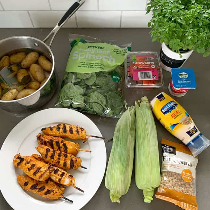 BBQ chicken, corn and potato salad ingredients