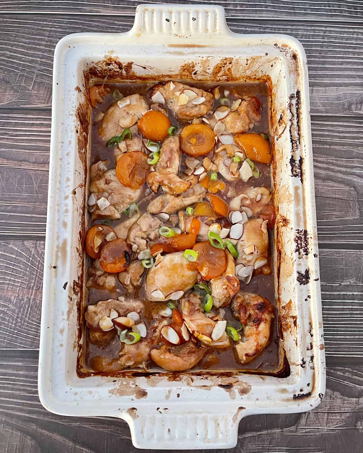 Apricot chicken tray bake after cooking in the oven.