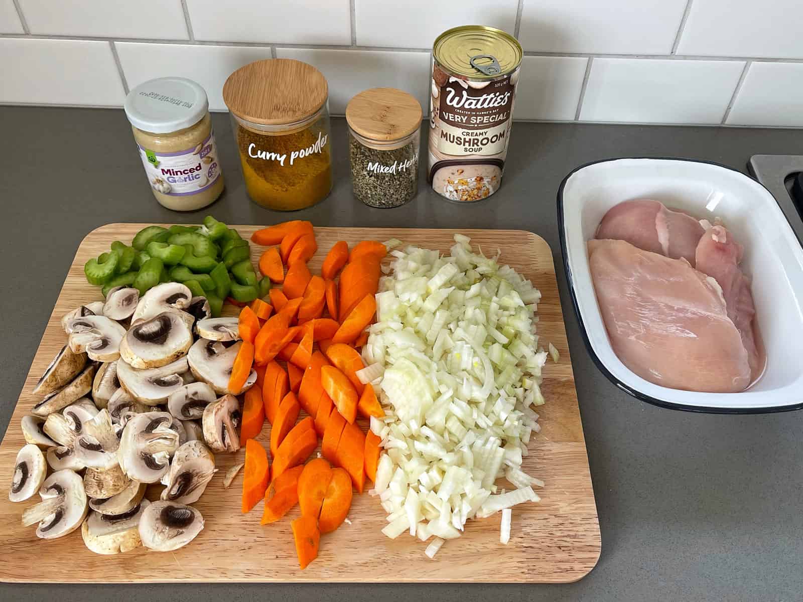 Ingredients for chicken pot pie on a grey bench