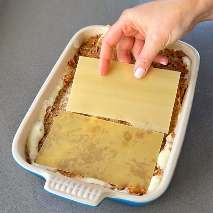 Vanya's Lasagne Layering up lasagne in a dish.