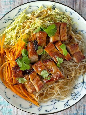 a close up of Chinese Pork with Noodles