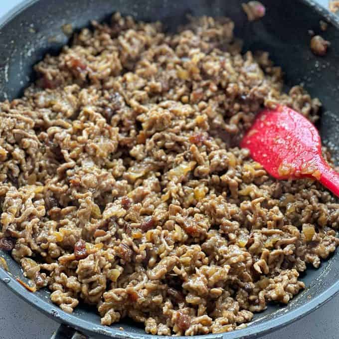 Moroccan Lamb Pies The filling for Moroccan Lamb Pies cooking in a frying pan.