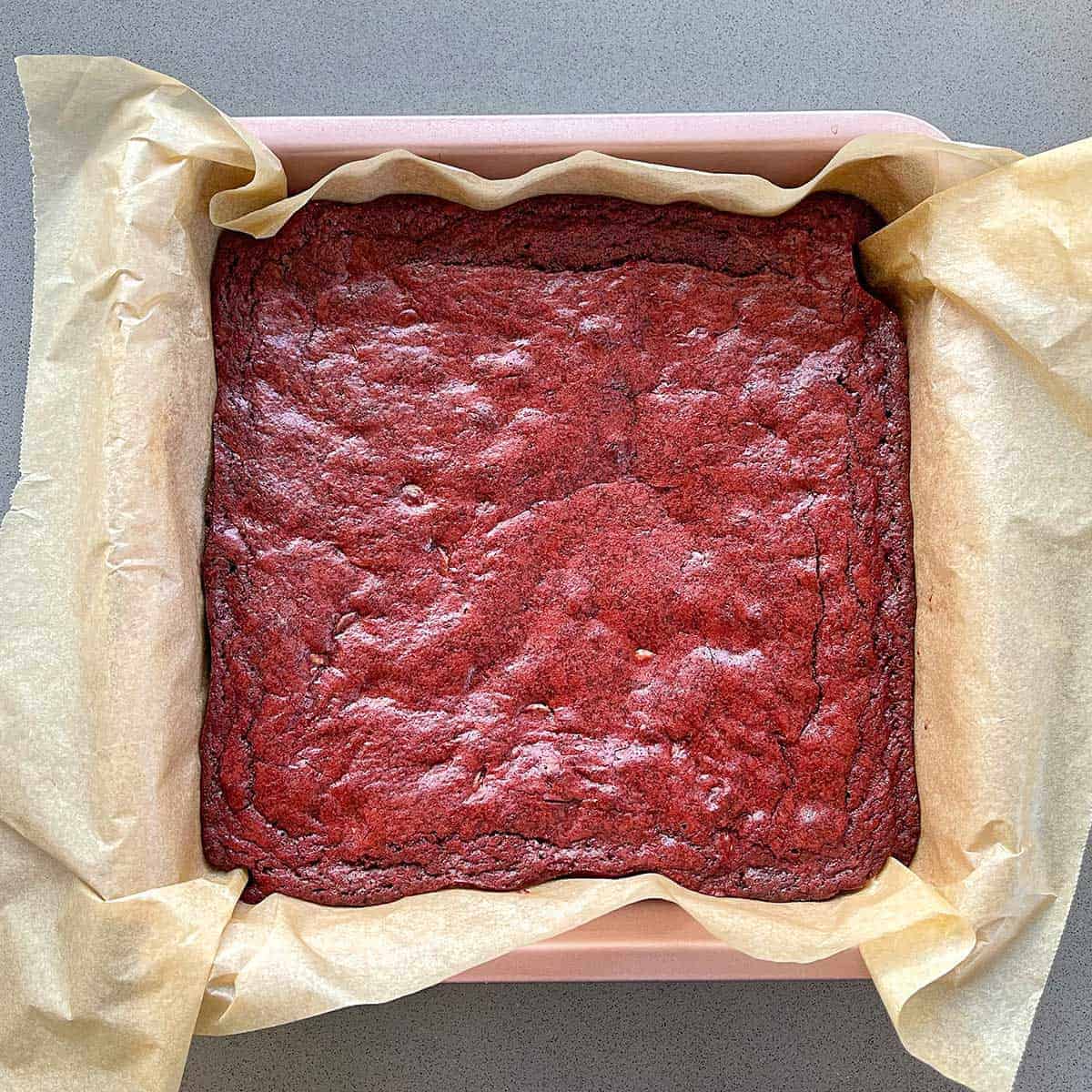 Cooked Red Velvet Brownie in a line baking tin.