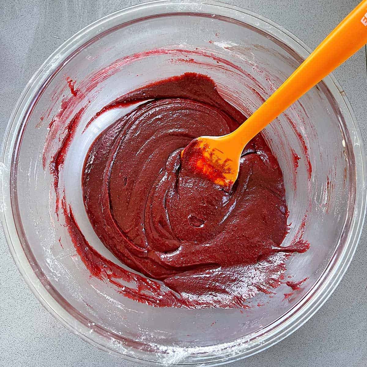 The ingredients for Red Velvet Brownie in a glass bowl.