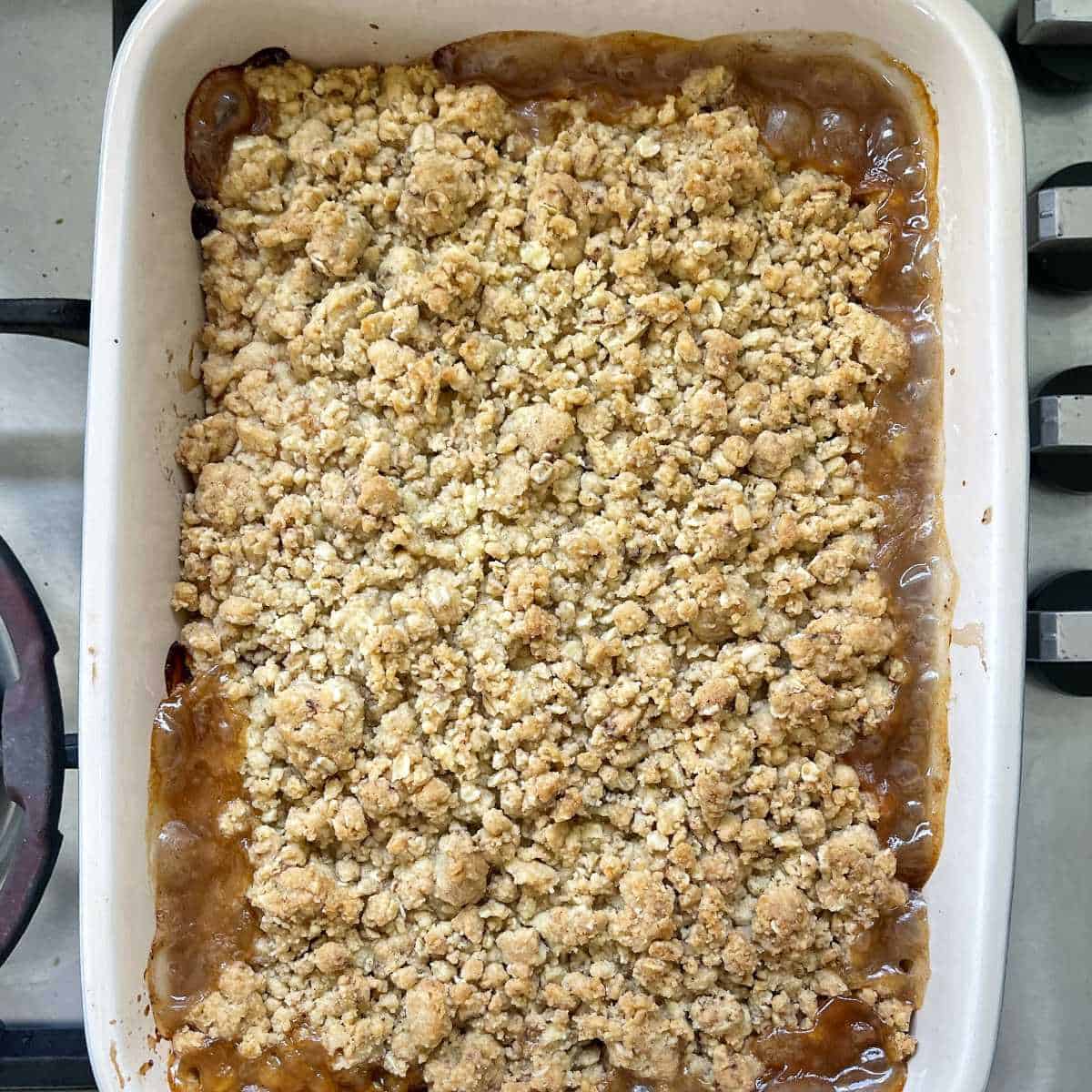 Cooked apricot crumble just removed from the oven