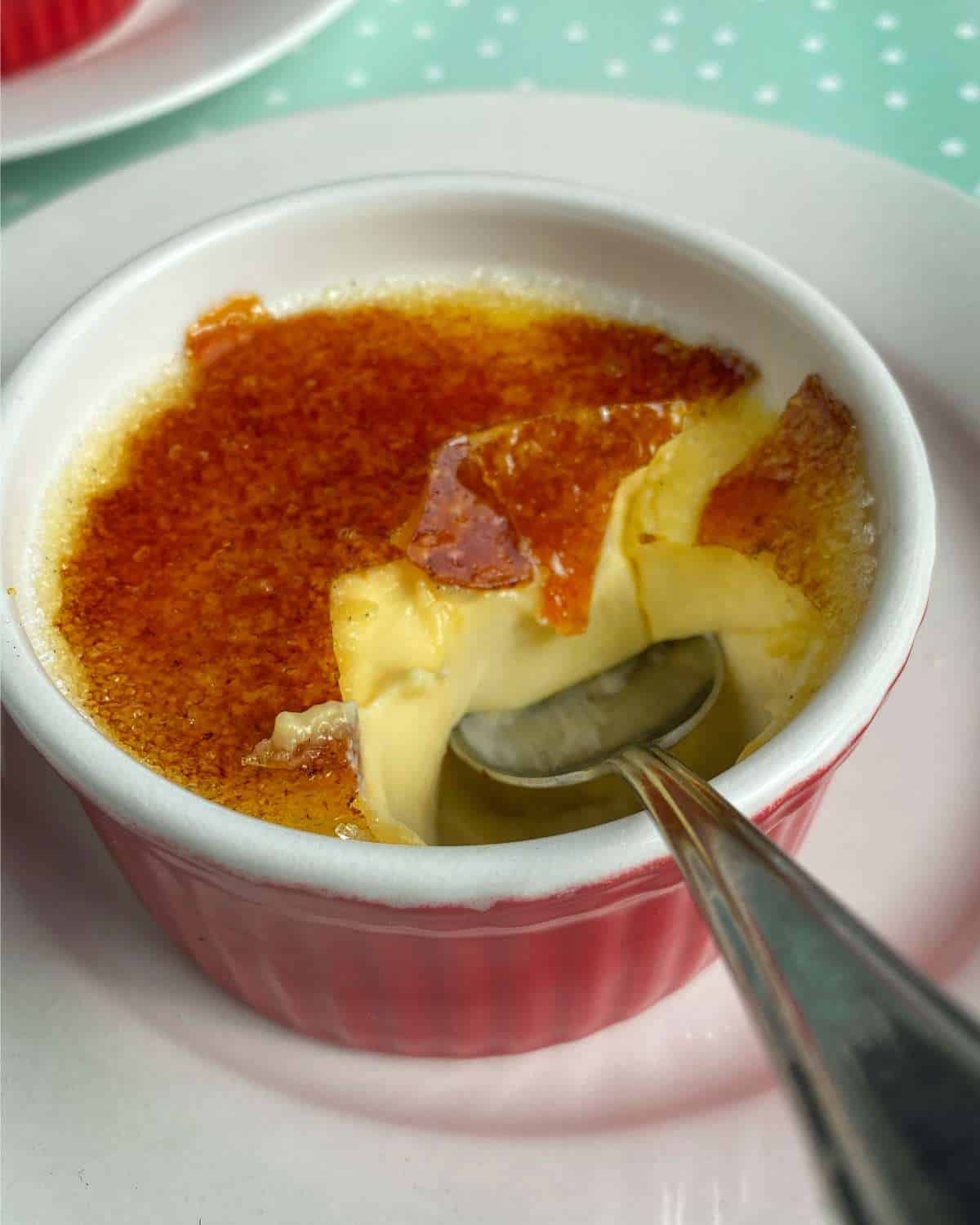 Set Brulee with a spoonful being spooned out