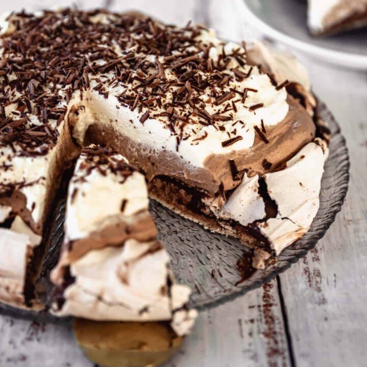 A piece of Chocolate Layered Pavlova being served up.