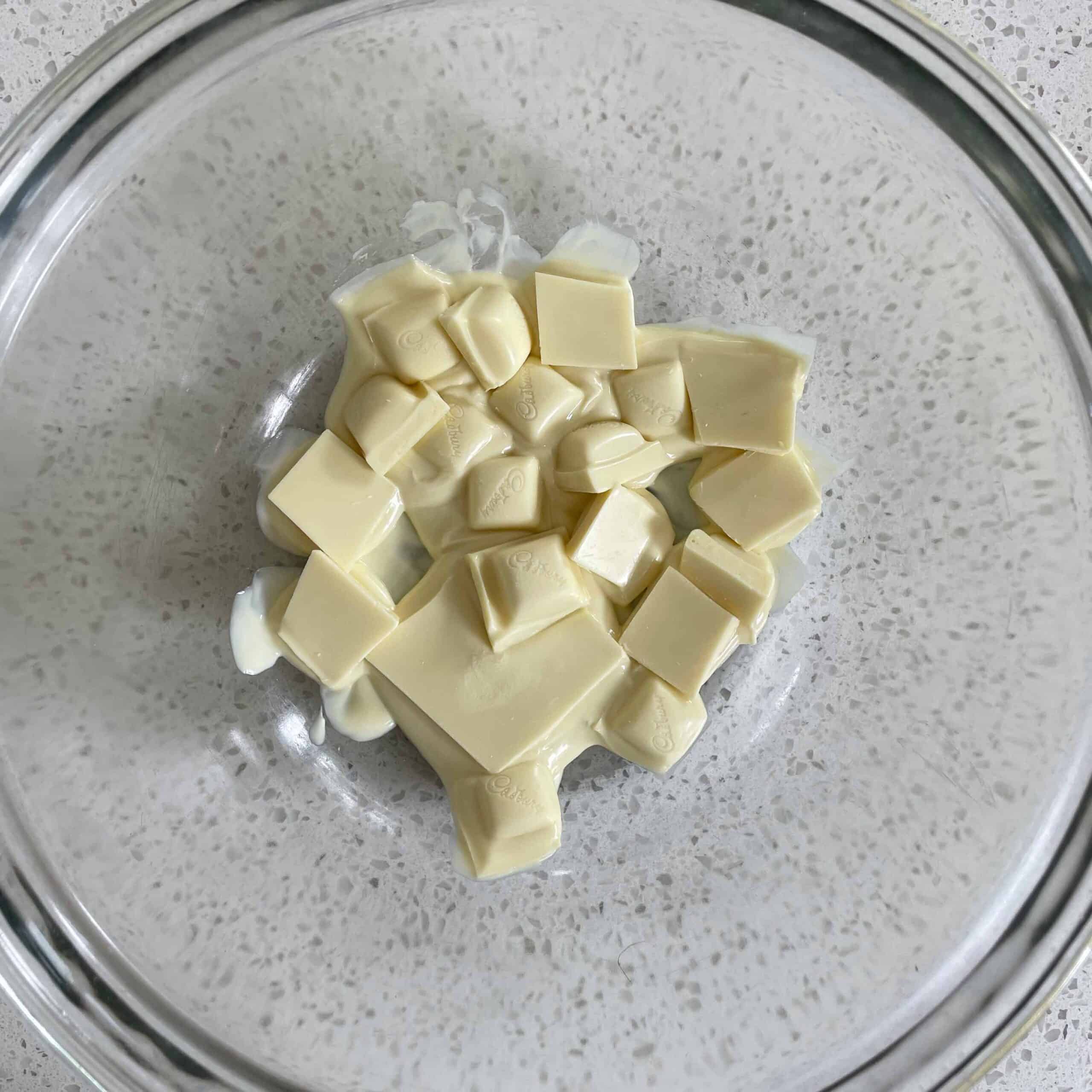 White chocolate melting in a bowl.