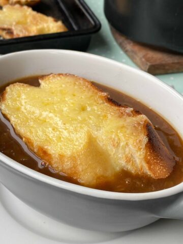 A close up of a bowl of French Onion soup