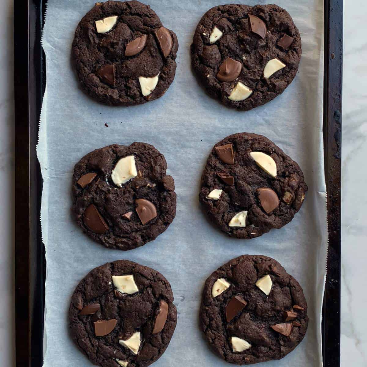 Cooked Triple Chocolate Cookies on a baking tray