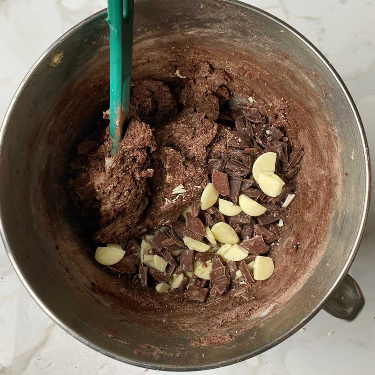 Triple chocolate cookie mixture in a mixing bowl