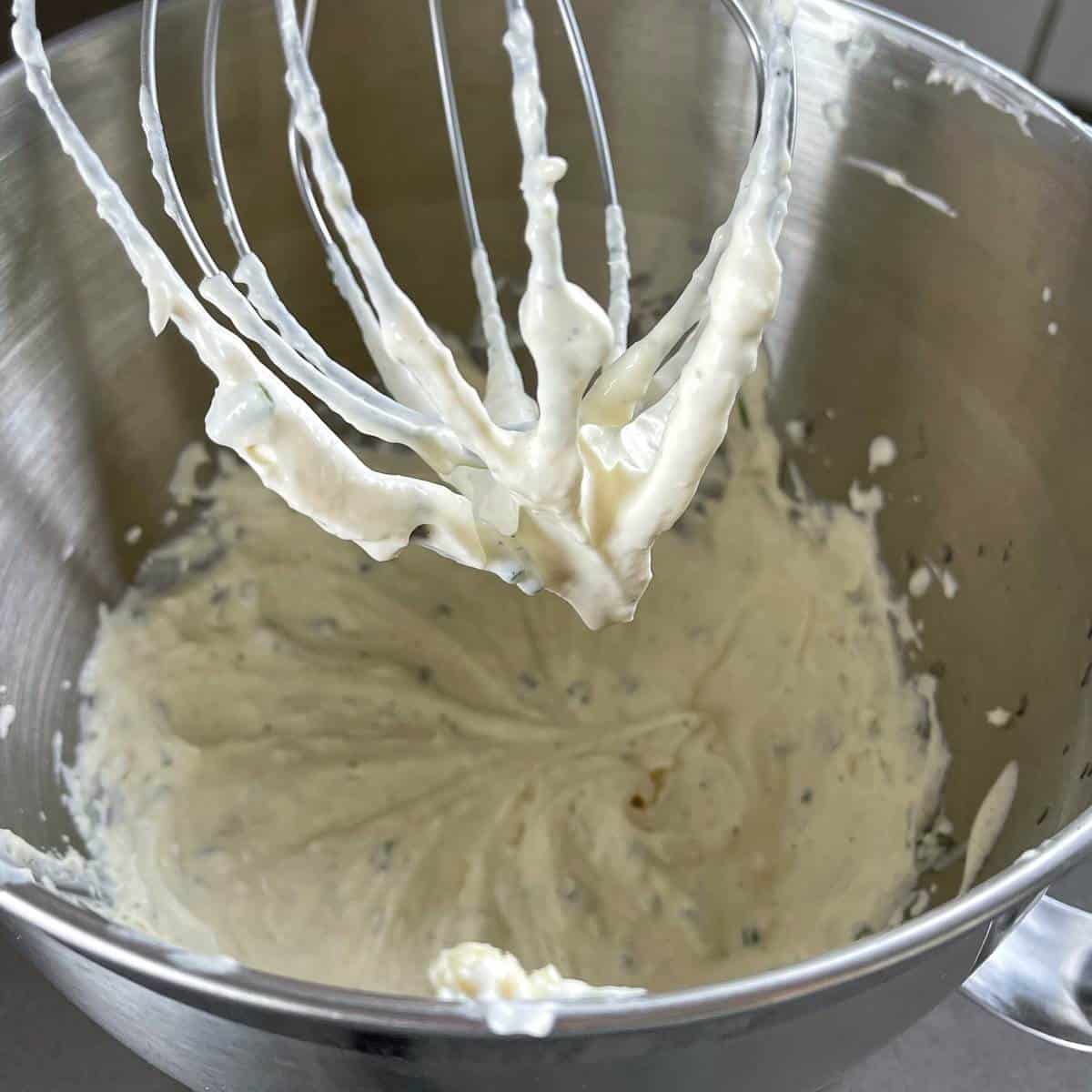 Creamed horseradish in a mixing bowl