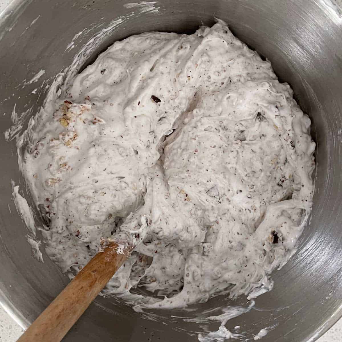 The combined mixture for Chocolate Almond Meringue Cookies in a mixing bowl.