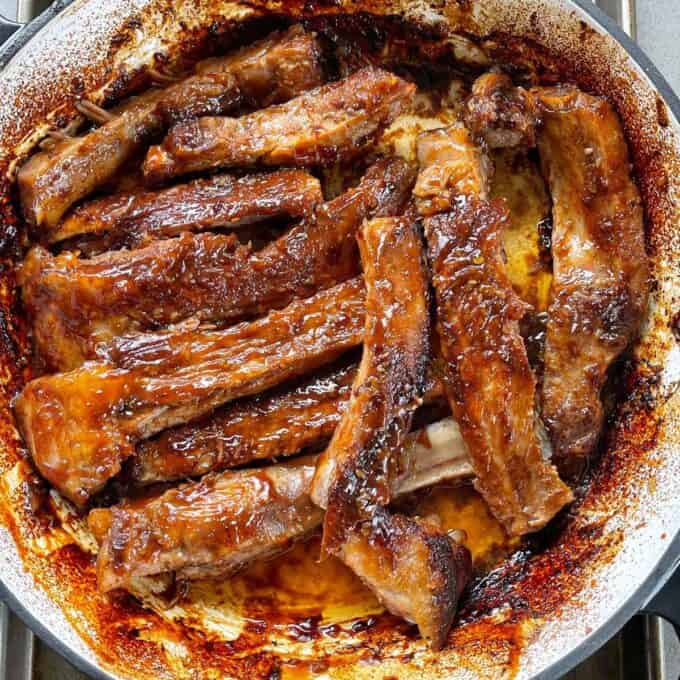 Cooked pork ribs in an oven proof dish.