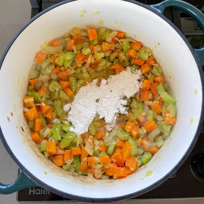 Cooked cubed onion, celery and carrot with flour added to help thicken the casserole filling.