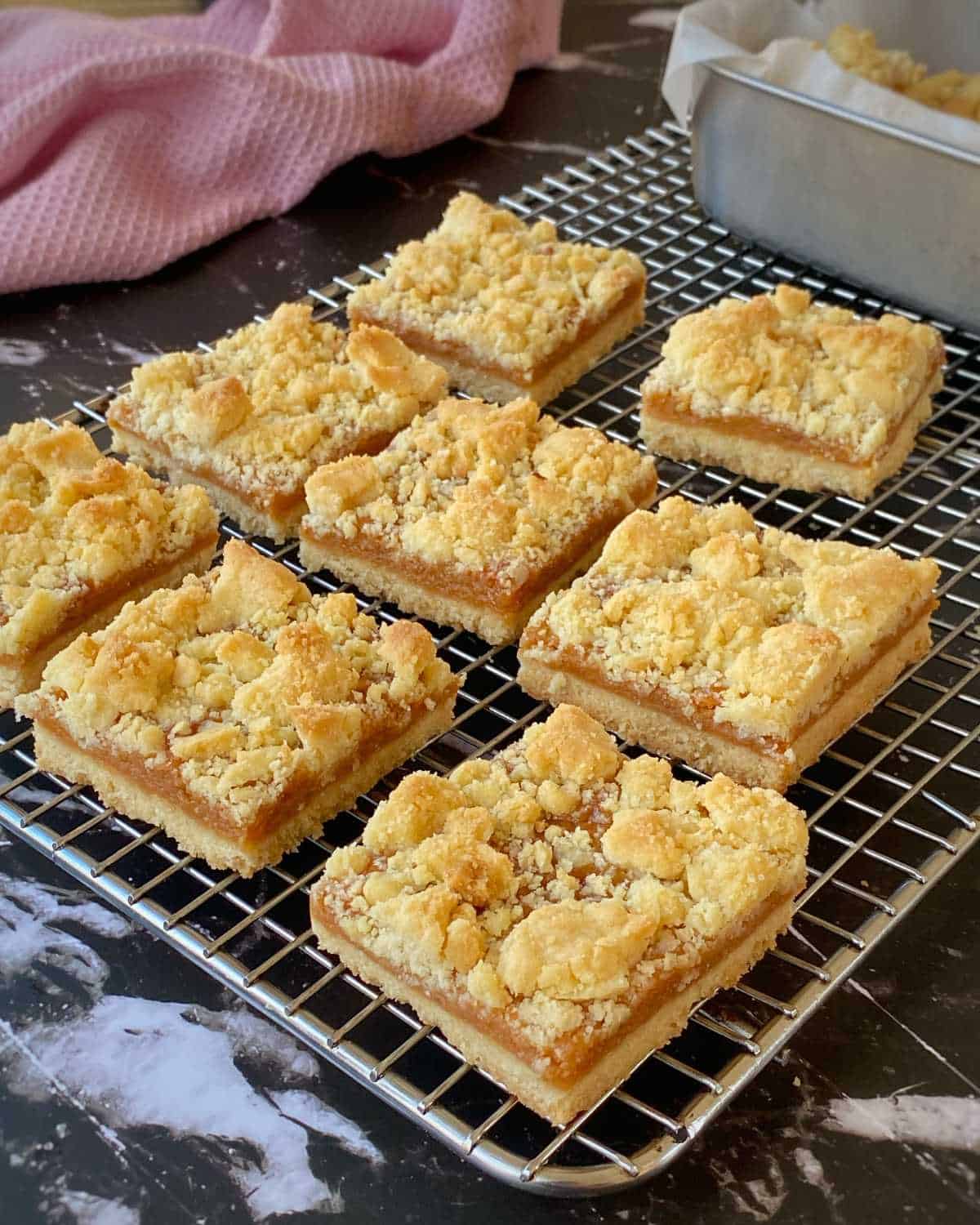 A selection of Tan Slice resting on a wired baking rack.