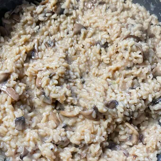 Cooked Mushroom Risotto in a frypan.