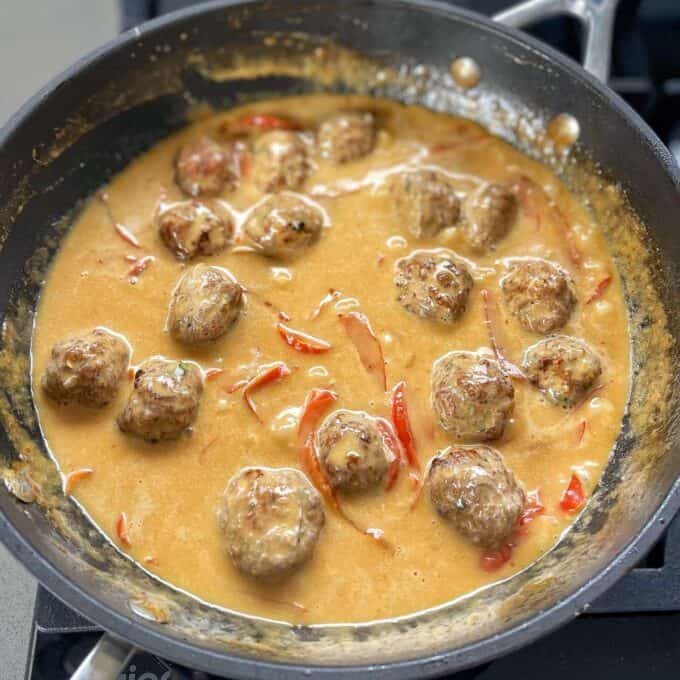 Mini Pork Meatball Curry simmering in a frypan