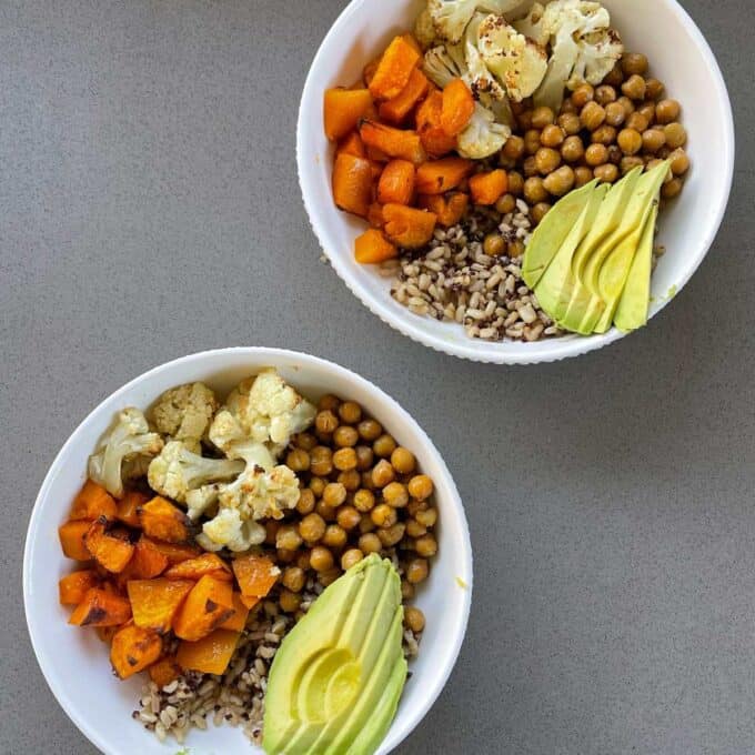 Two assembled Nousish Bowls on a grey bench top.