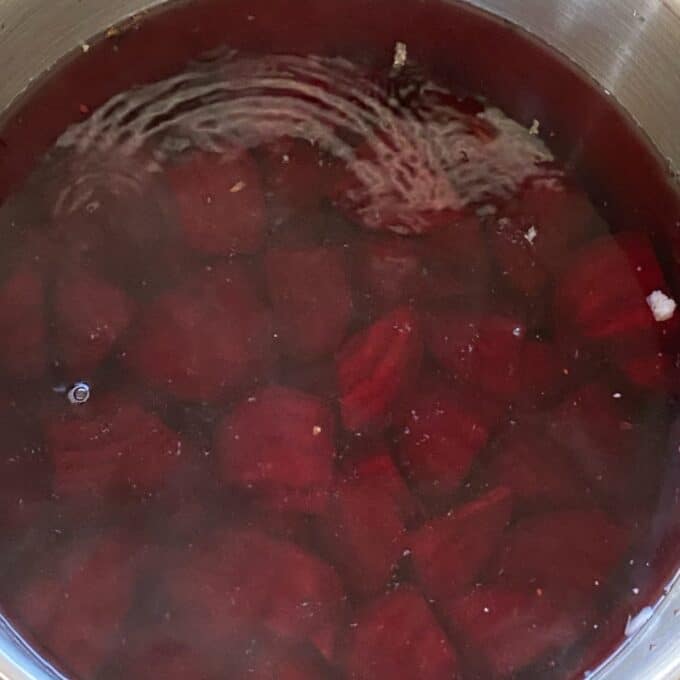 Diced beetroot in a large pot filled with water