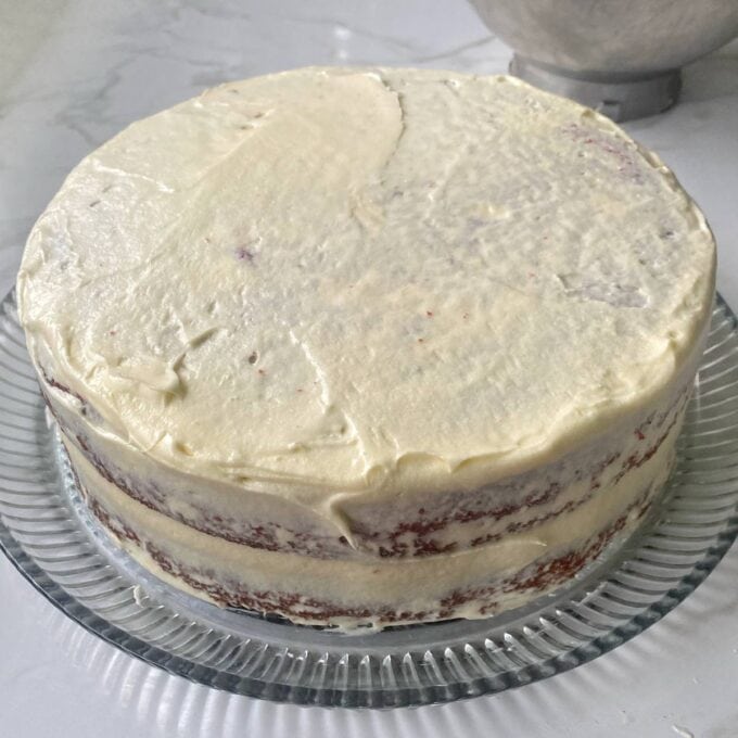 Iced Red Valvet Cake on a around glass plate