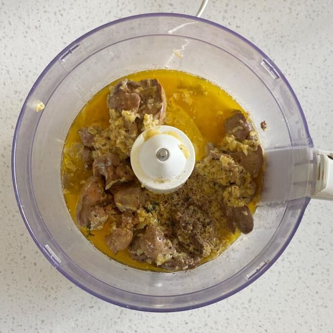Cooked chicken liver in a food processor before being mixed until smooth