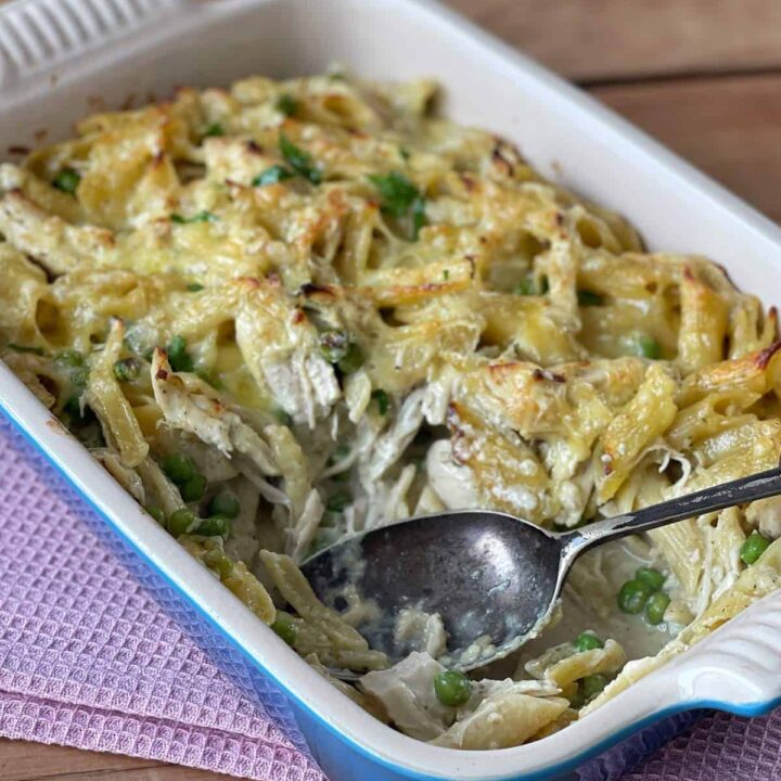 A casserole dish with a spoon.