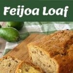 A sliced feijoa loaf with butter on a wooden board, surrounded by fresh feijoas, with baking ingredients and a packaged mix shown above.