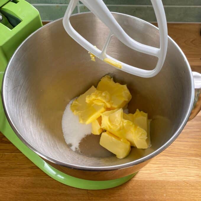 Chocolate Cornflake Slice Butter and sugar in a mixing bowl of a stand mixer with a paddle attachment, ready to be mixed.