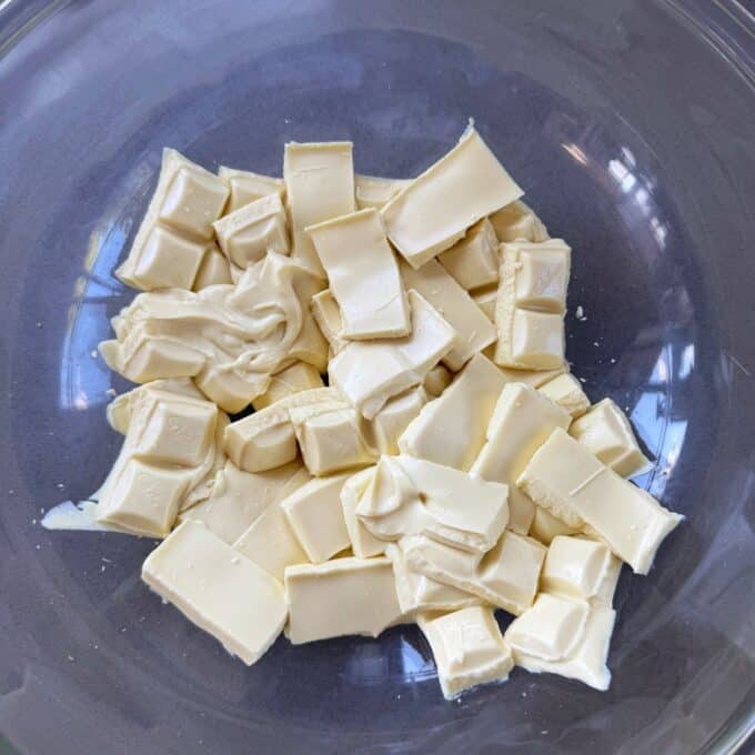 XL Pick and Mix Lolly Slice Chopped pieces of white chocolate in a clear glass bowl.